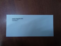 Envelope with school logo